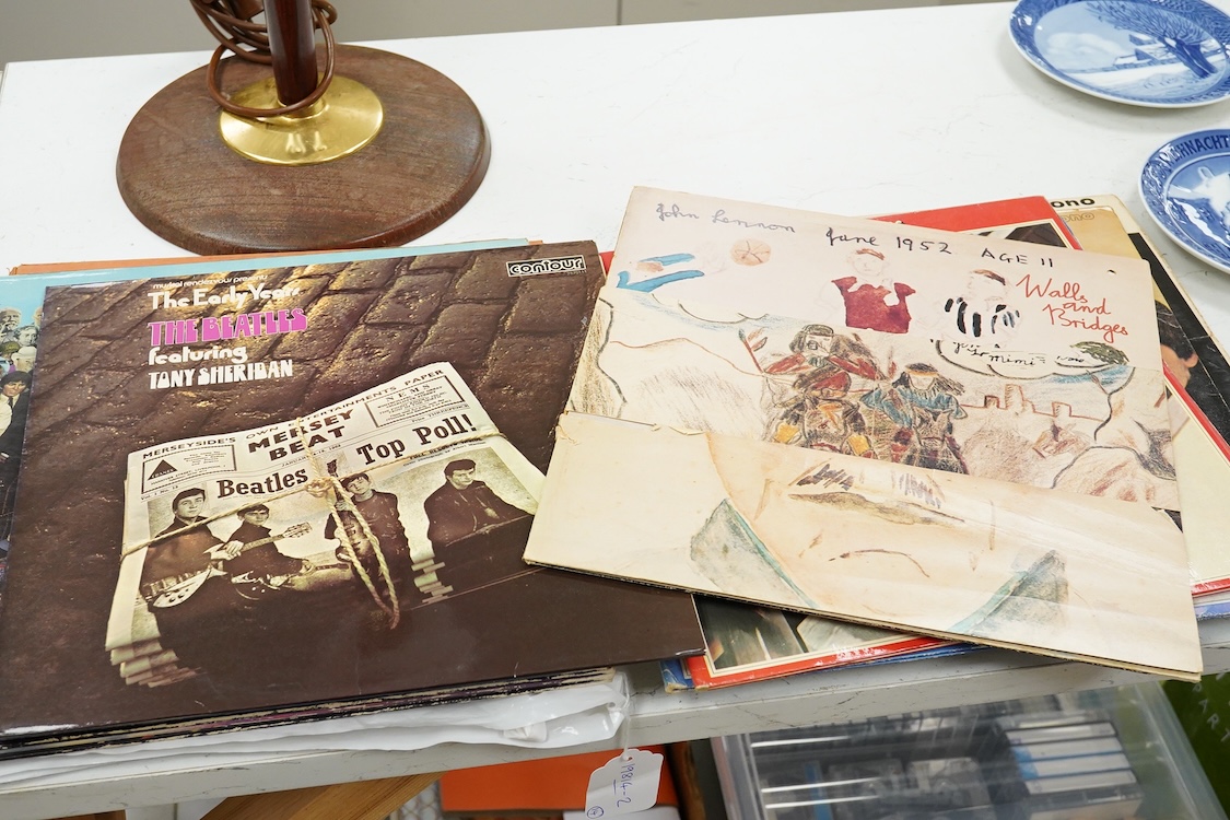 Fourteen The Beatles related LP record albums, including; Rubber Soul, The Beatles at the Hollywood Bowl, With The Beatles, Beatles For Sale, Sgt. Pepper, Revolver, McCartney II, Wings Over America, the Concert for Bangl